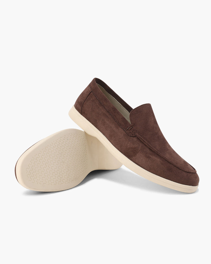 Elegante Leder-Loafer, unisex, mit dezenter Steppung, für einen smarten Look.