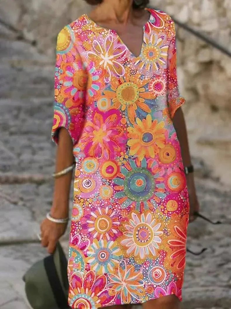 Modisches V-Ausschnitt Blumenkleid mit langen Ärmeln für Damen. Trendiges Herbstkleid, bequem und stylisch.