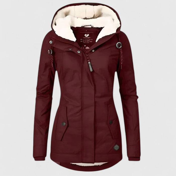 Rückansicht der stylischen Damen Winterjacke, wasserdicht mit Kapuze, perfekt für kaltes Wetter.