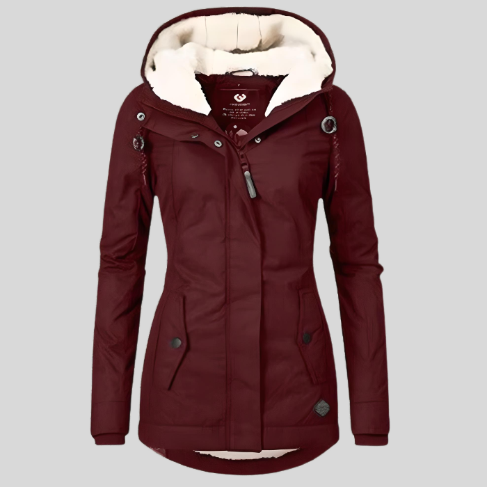 Detailansicht: Hochwertiger langer Damen Wintermantel mit Kapuze. Isoliert, wasserdicht & robust für Outdoor-Abenteuer.