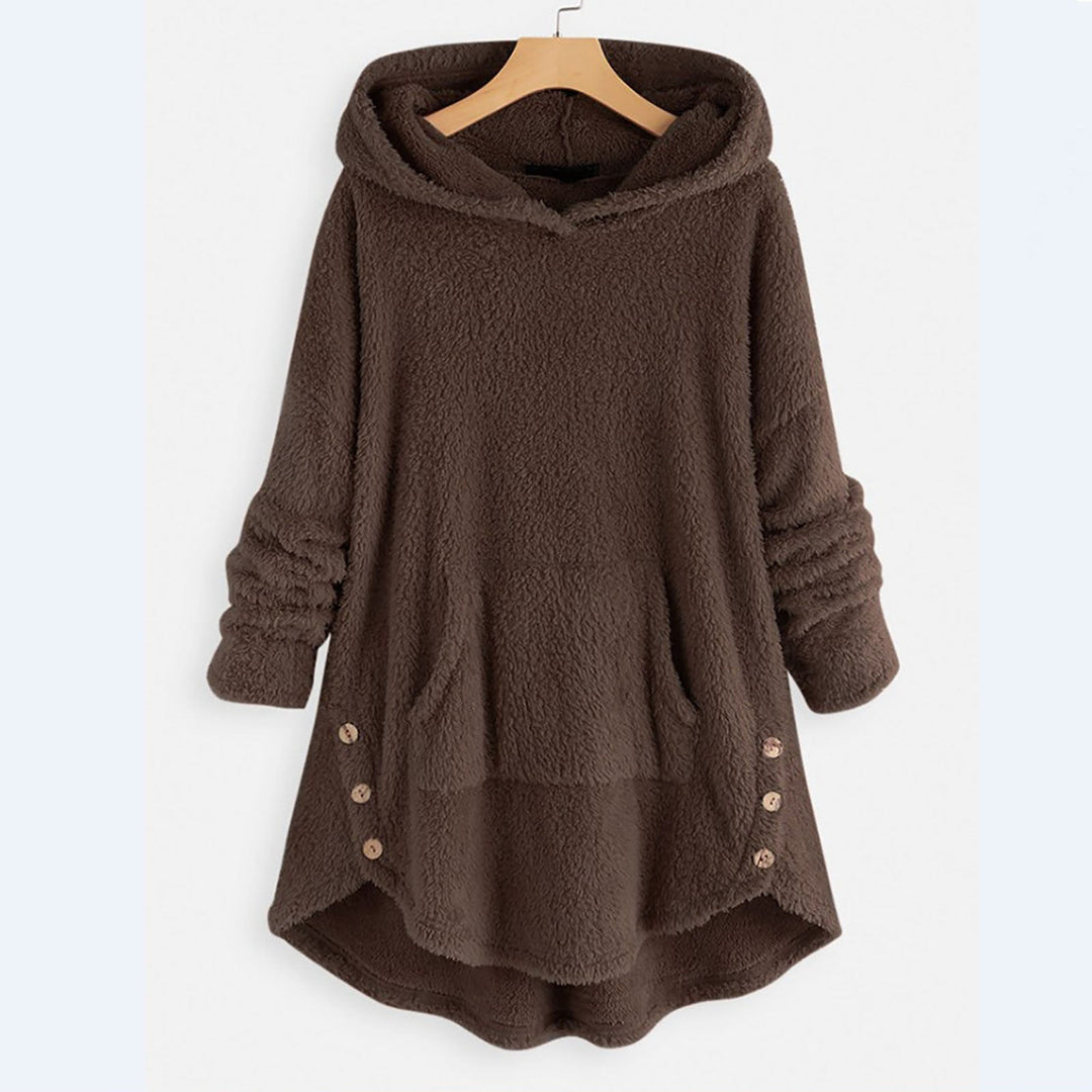 Detaillierte Ansicht des kuscheligen Kapuzenpullovers. Weicher Stoff des Damen Hoodies für Wärme.