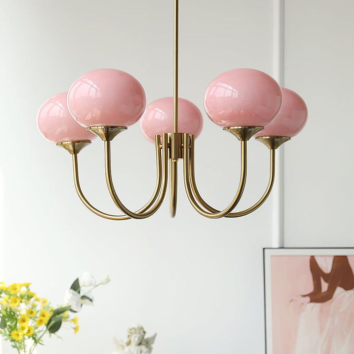 Elegante Designlampe, goldfarben, mit Bernsteinfarbenen Glas-Schirmen; wohnliche Akzentbeleuchtung.