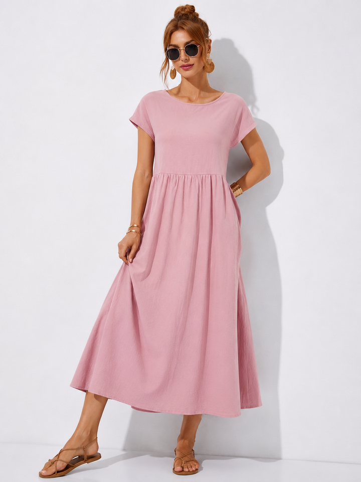 Damen Freizeitkleid Mathilda: Mühelose Eleganz und Komfort. Kurzärmliges A-Linien-Sommerkleid mit stilvollen Falten.