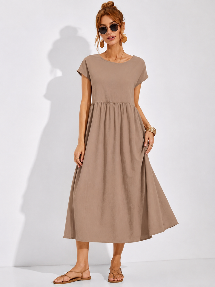 Weiches Damen Freizeitkleid Mathilda, elegantes Kurzarm-Kleid mit Falten, bequemes A-Linien-Sommerkleid für stilvolle Frauen.