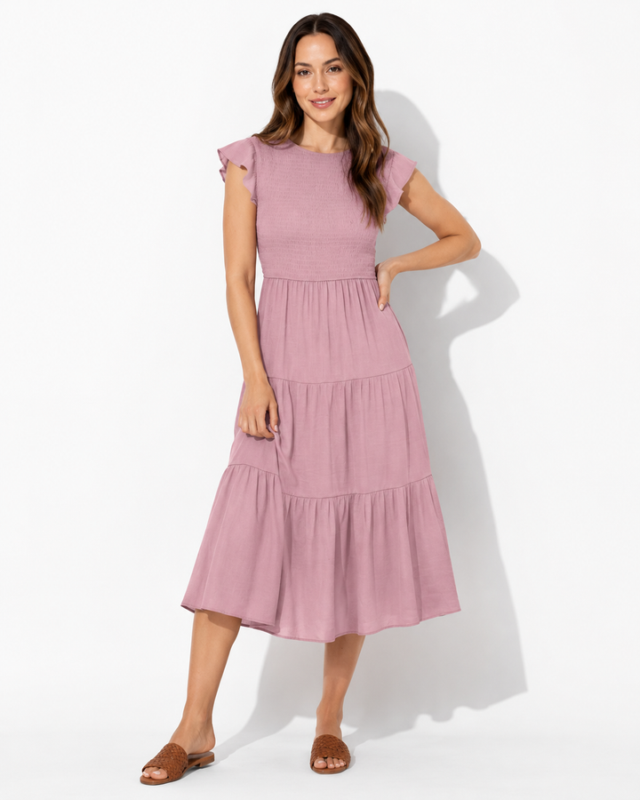 Raffiniertes, elegantes Damenkleid mit bauchbedeckender Passform und weichem Stoff. Ideal als Sommerkleid.