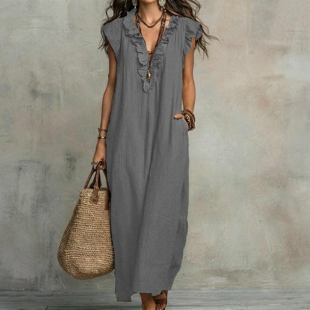 Fließendes Sommer Maxikleid für Damen, V-Ausschnitt, Rüschen und weiter Schnitt für maximale Bewegungsfreiheit.
