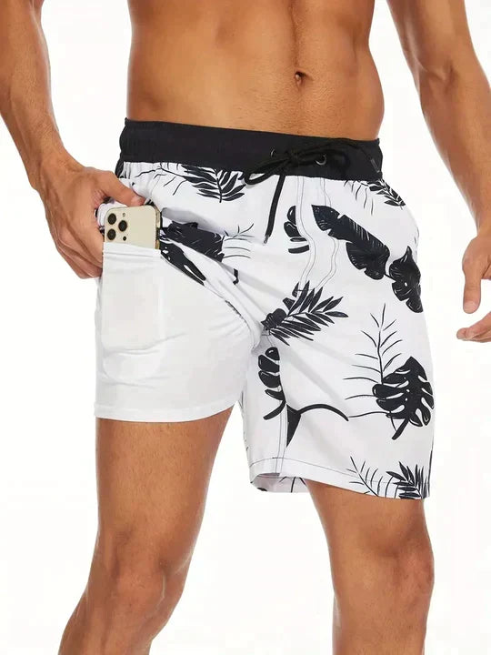 Robuste Herren Badehose, schnelltrocknend, mit lebendigem tropischem Muster für jede Aktivität.