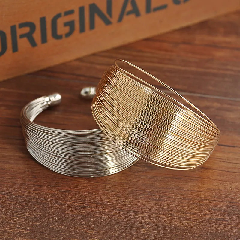 Schicker Damen Manschettenarmreif EleganceCuff, Edelstahl Schmuck in Gold- oder Silberfarbe, modisch und modern.