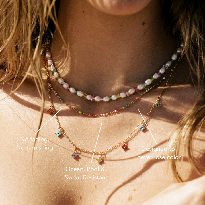 Eleganter und bunter Damen Halskette Choker in Neonfarben mit goldenen Edelstahl-Details.