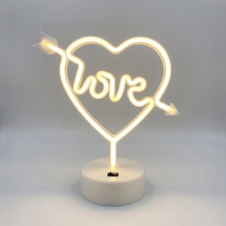 Kompakte Neovelle Neon-Tischleuchte, ideal für kleine Räume und Regale.
