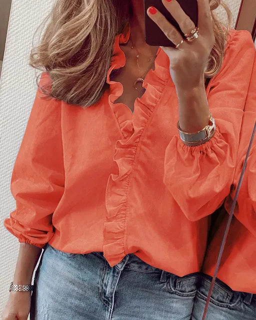 Damen Rüschenbluse mit langen Ärmeln, ideal als schickes Büro Oberteil oder modische Freizeitbluse. Femininer Stil.