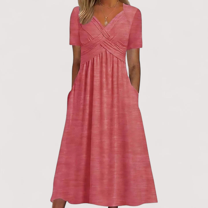 Modisches Damen A-Linien-Kleid in Midi-Länge. Elegant, vielseitig und bequem für Büro oder festliche Anlässe.