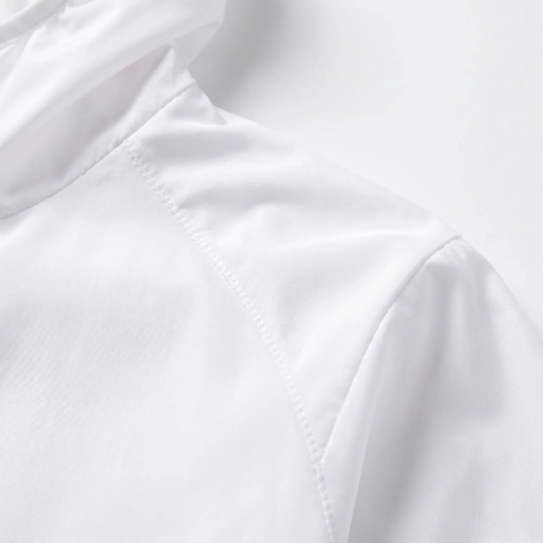 Packbare AeroLayer Herrenjacke, windresistent, ideal für Reisen & wechselhaftes Wetter.