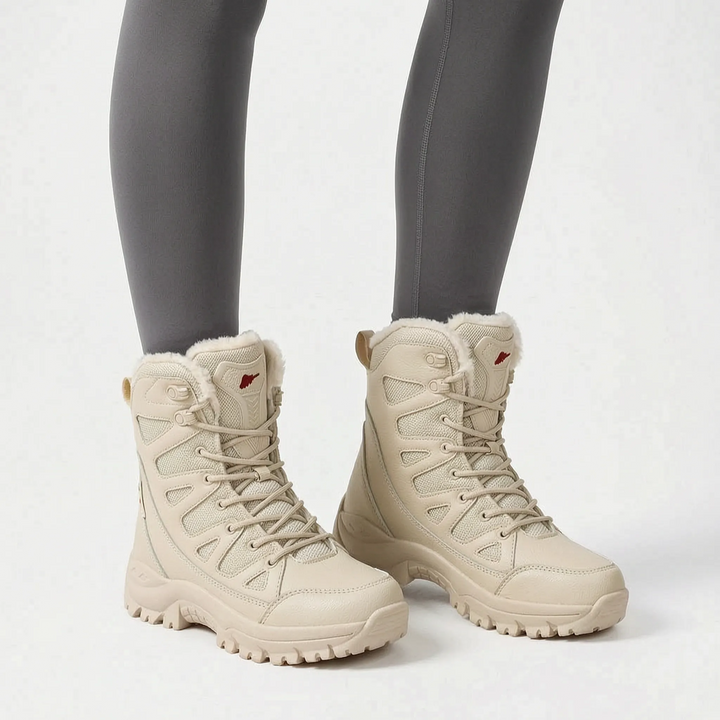Bequeme beige Damen Wanderschuhe mit griffiger Profilsohle für winterliche Outdoor-Touren.