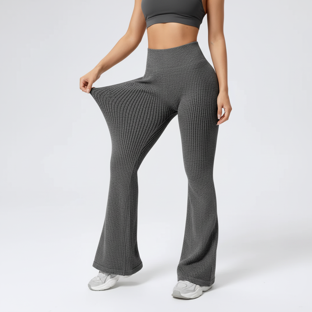 Figurformende Damen-Schlaghose in Schwarz, dehnbar & atmungsaktiv, für Workout & Freizeit.