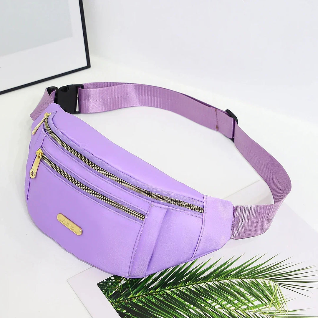 Ergonomische Hüfttasche mit mehreren Reißverschlussfächern. Perfekt für Sport und täglichen Gebrauch.