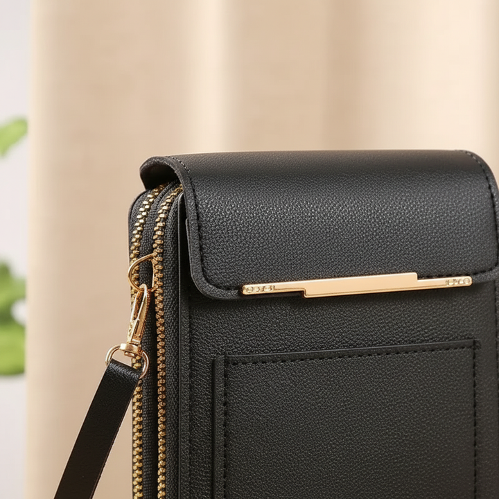 Stilvolle Damen Crossbodytasche aus PU-Leder mit Touchscreen-Fach für das Smartphone und Reißverschluss.