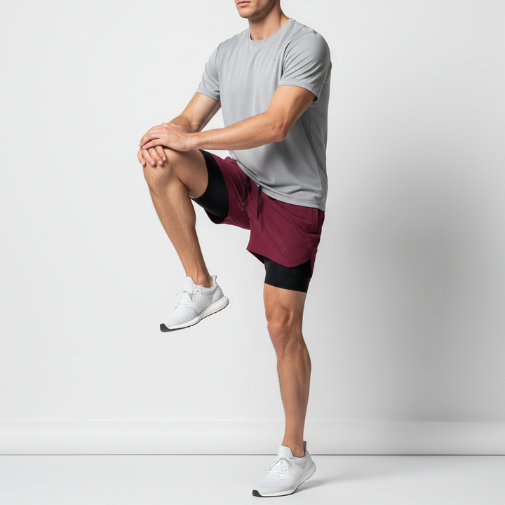 Stylische Dynaflex Fitnessshorts für Herren, doppellagig, atmungsaktiv, perfekt für intensives Gym-Training.