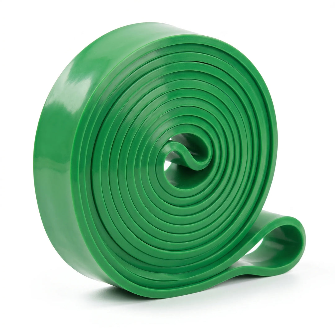 FlexLoop Widerstandsband auf dem Boden, bereit für vielseitiges Heimtraining und intensive Workouts zu Hause.