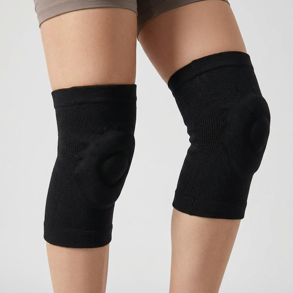 Schwarzer Unisex Knieschoner für Basketball, Skaten & Radfahren. Bietet Gelenkstütze.