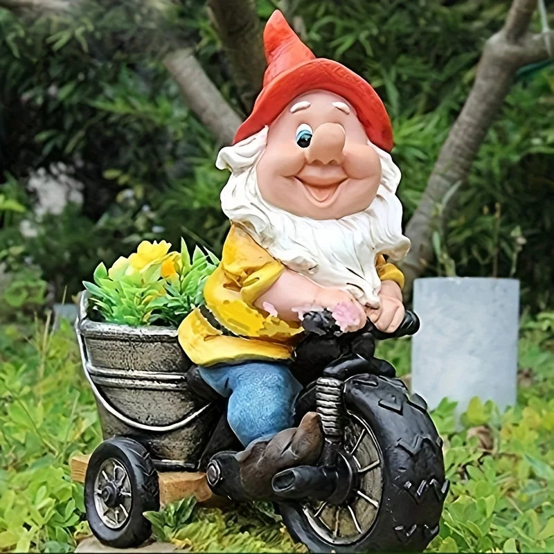 Einzigartiger Gartenzwerg auf Dreirad. Lustige wetterfeste Gartenfigur mit Blumenkübel, perfekt für Outdoor.