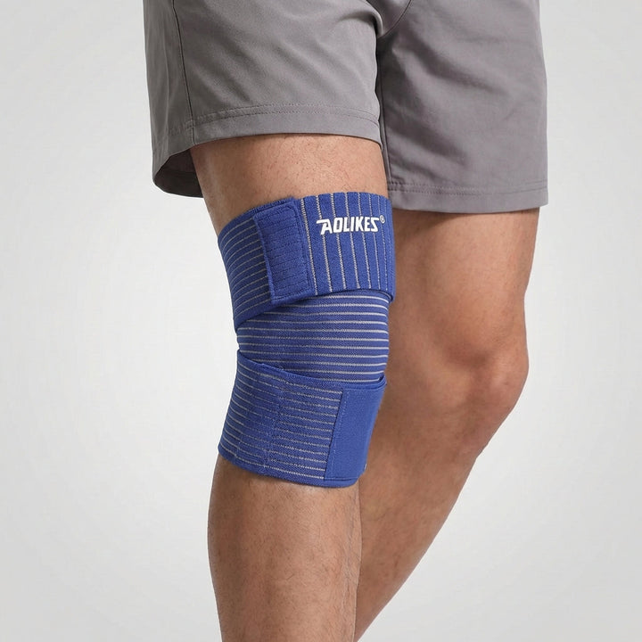 Schwarze, verstellbare Kompressionsbandage aus atmungsaktivem Nylonmaterial.