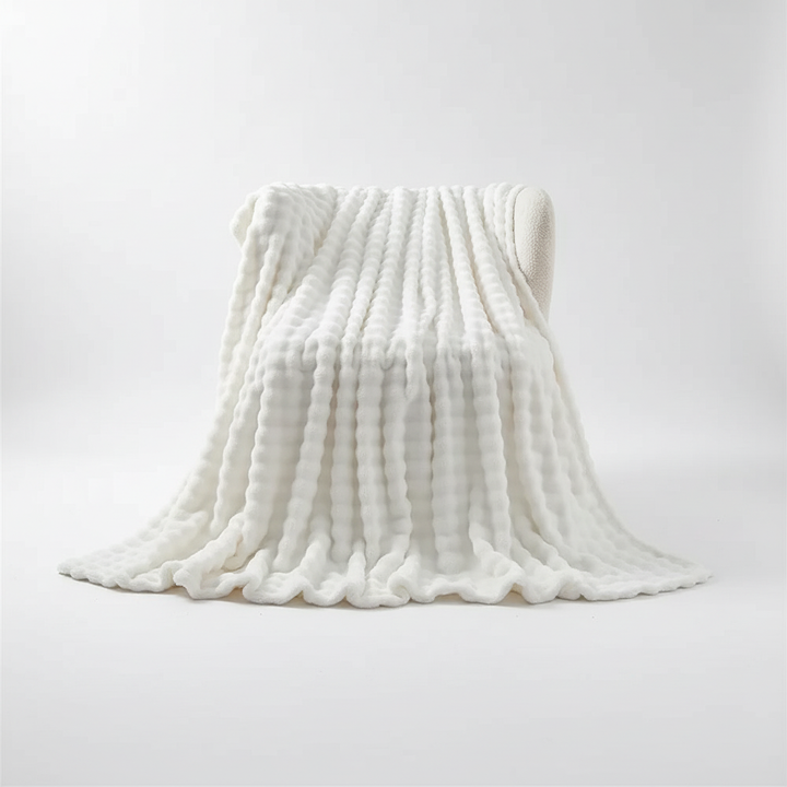 Flauschige Kuscheldecke: Wolldecke mit luxuriöser Weichheit. Ideal für entspannte Momente zu Hause.