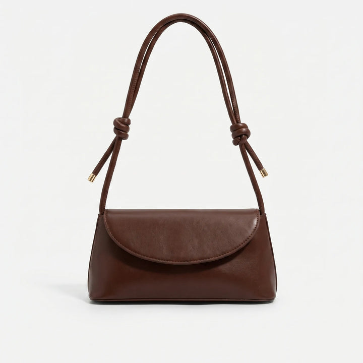 Quadratische Damen Klapptasche mit stylischem geknotetem Riemen in Beige. Elegante Alltagstasche zum Umhängen.
