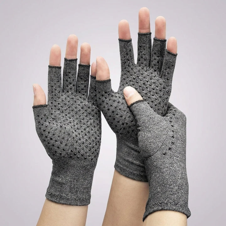 Unisex Kompressionshandschuh fingerlos grau mit Non-Slip-Funktion für Karpaltunnel-Schmerzlinderung.