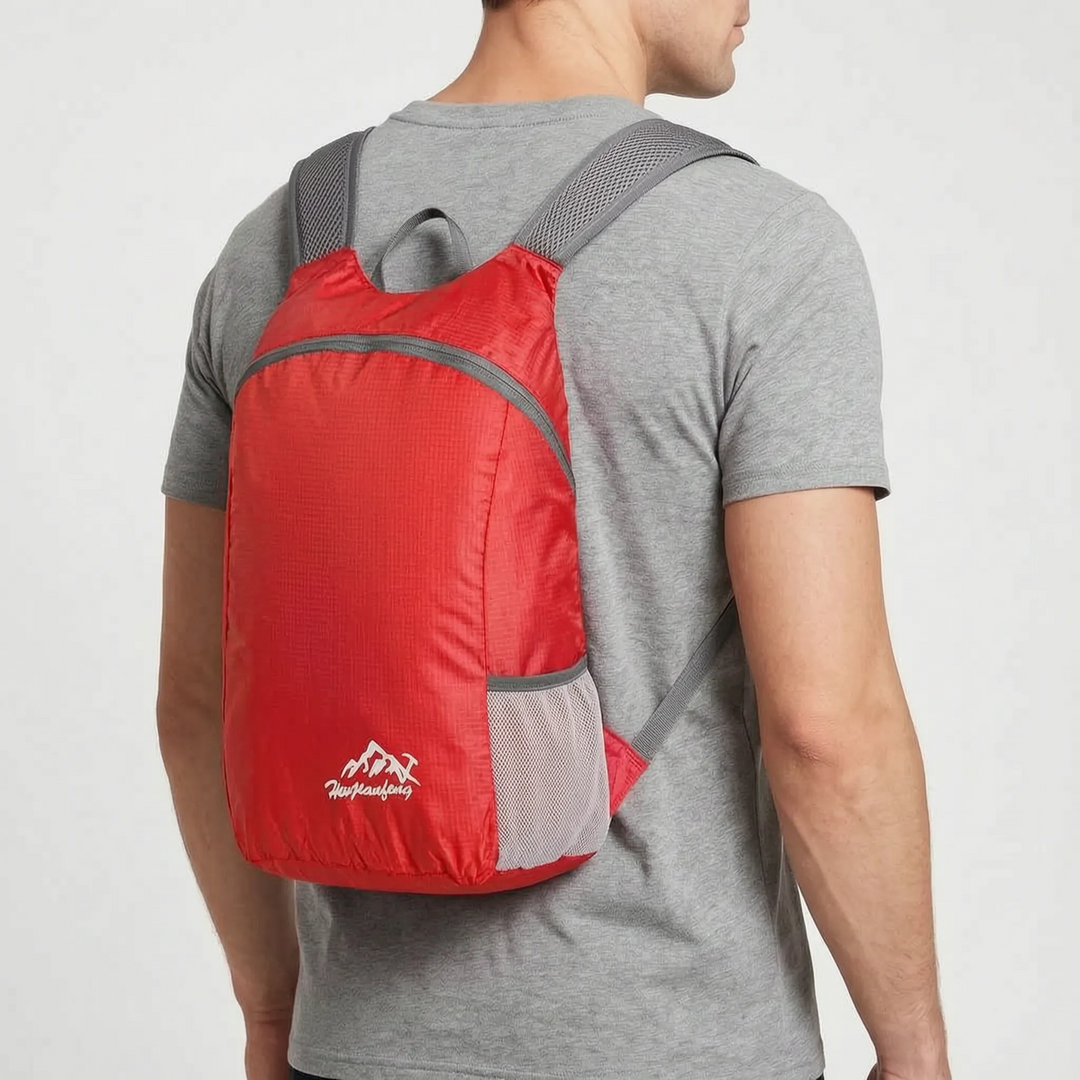 Ultrakompakter, gefalteter Rucksack aus Nylon, leicht & ideal zum Verstauen in Koffer oder Handtasche.