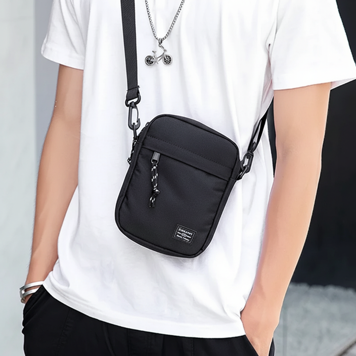 Kleine Unisex-Umhängetasche mit Reißverschluss, perfekt als modische Crossbody-Tasche für den urbanen Alltag.