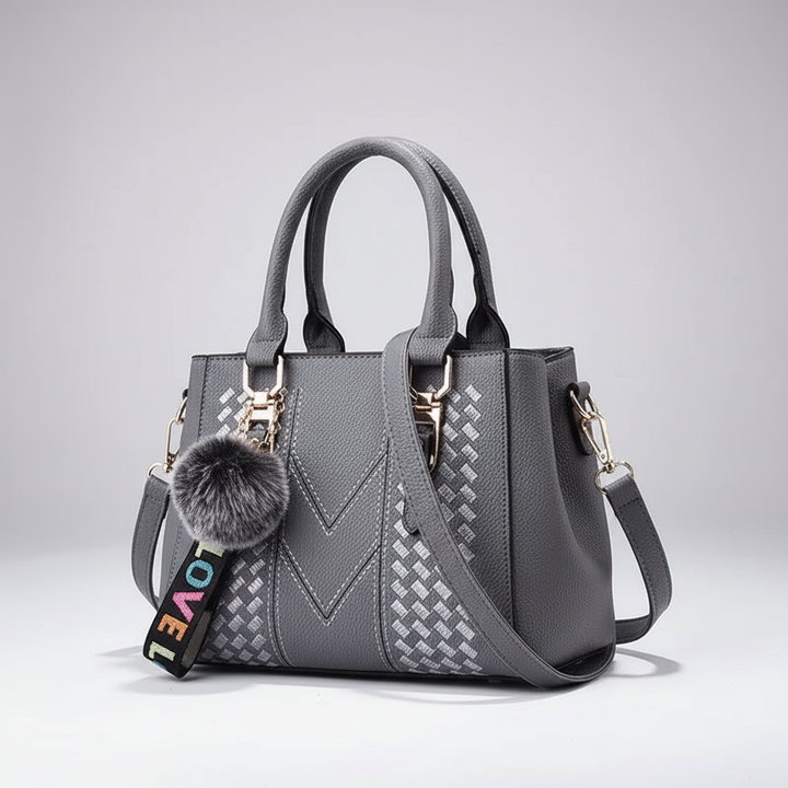 Hochwertige Damenhandtasche im Satchel-Look, aus pflegeleichtem PU-Leder gefertigt.