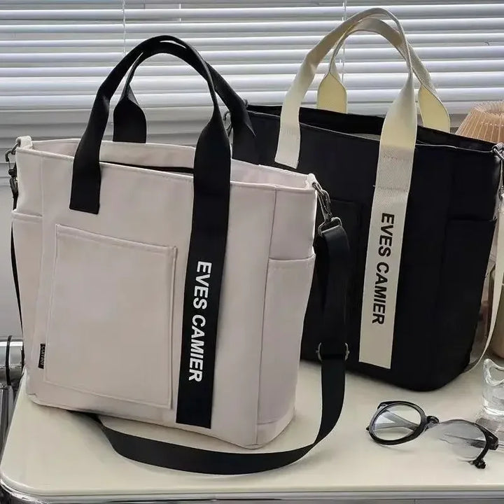 Organisierte, geräumige Damen Shopper-Tasche mit Alltagsgegenständen, wasserabweisendes Nylon als Schultertasche.