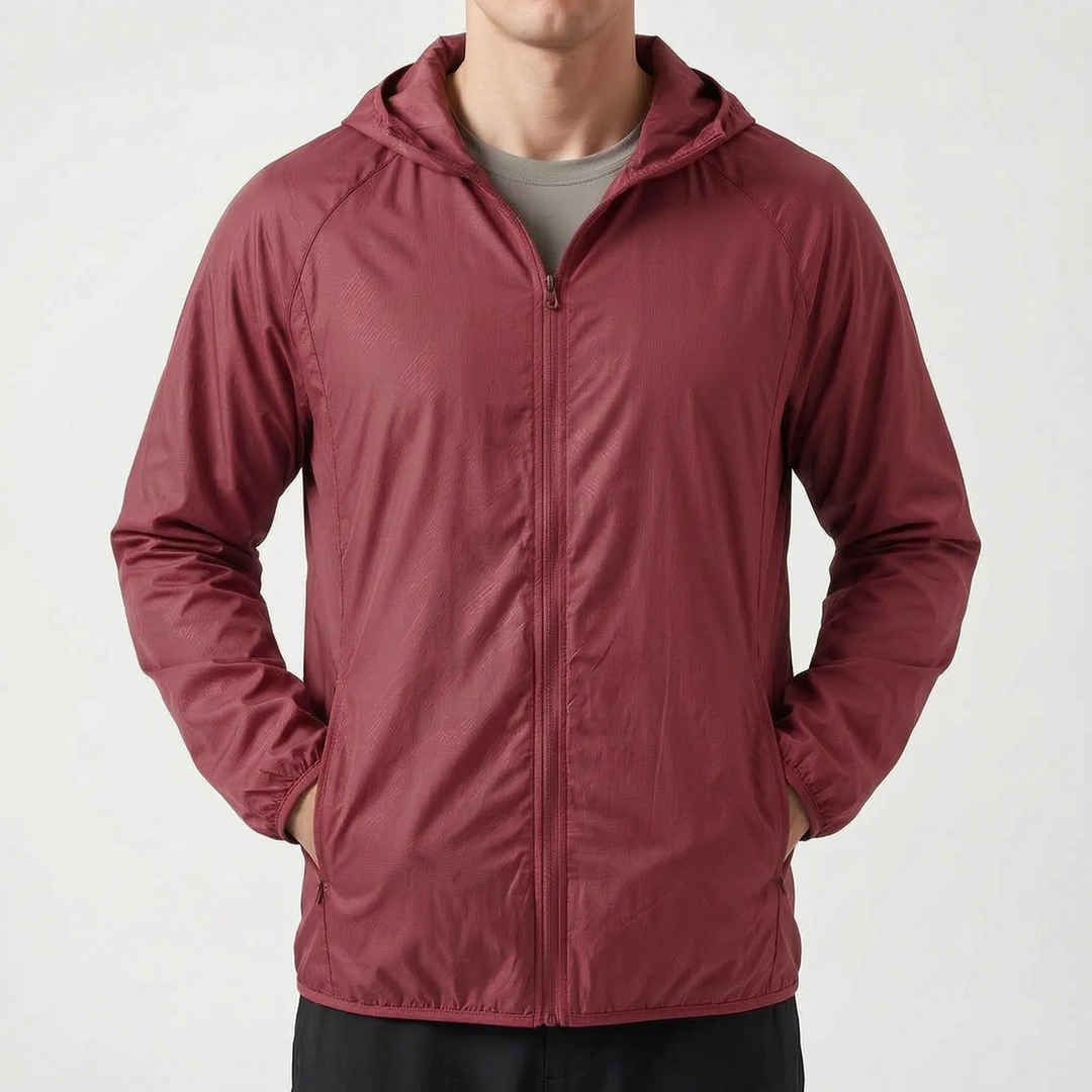 Packbarer Unisex TrekLite Windbreaker, ideal als leichte Reisejacke für unterwegs.