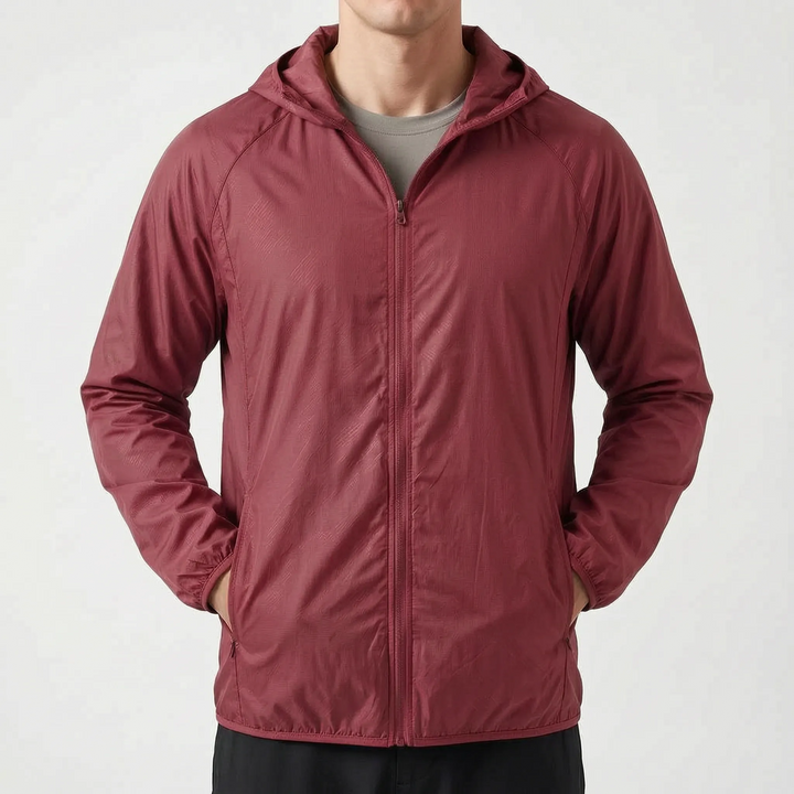 Packbarer Unisex TrekLite Windbreaker, ideal als leichte Reisejacke für unterwegs.