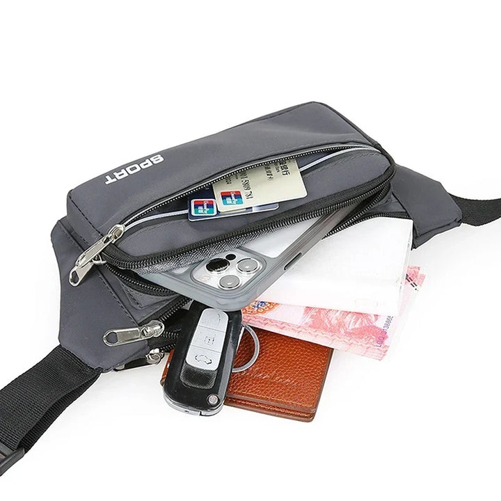 Kompakte Unisex Hüfttasche mit viel Stauraum durch mehrere Fächer. Perfekt für den täglichen Gebrauch & Sport.