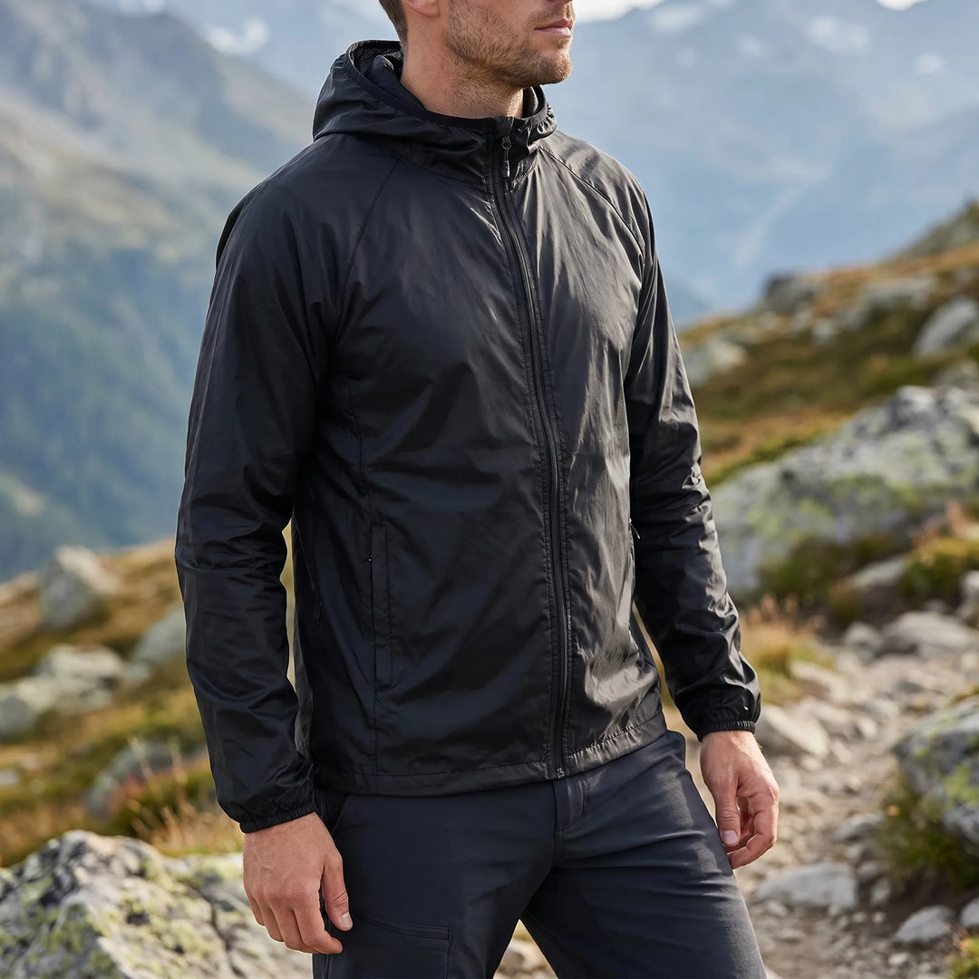 Packbare unisex Outdoor-Windjacke mit Kapuze, ideal zum Wandern, Camping & Reisen.