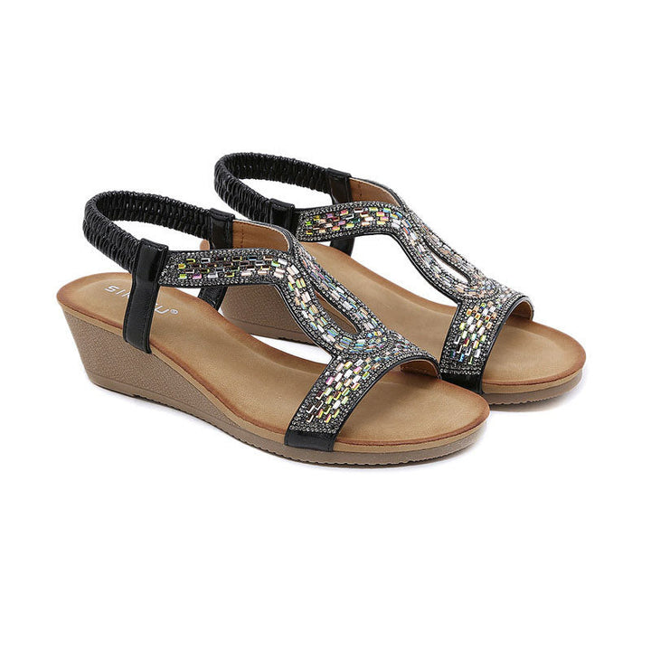 Elegante Sommerschuhe: Schwarze Keilabsatz-Sandalen für Damen, glitzernd & komfortabel.