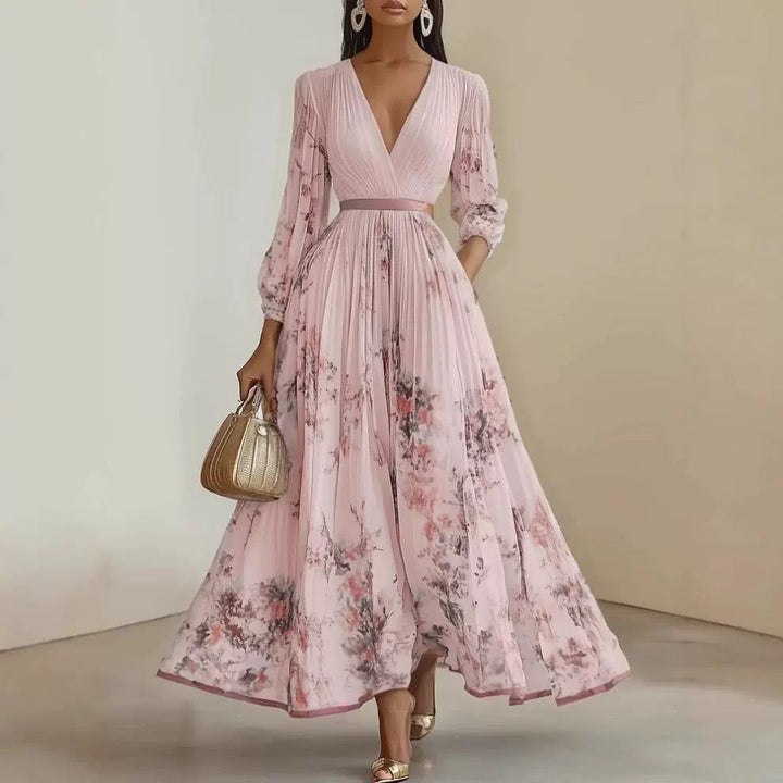 Fließendes langes Damen Sommerkleid mit romantischem Blumenmuster. Ideal für festliche Freizeit-Looks.