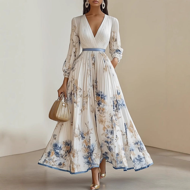 Elegantes Damen Maxikleid mit floralem Blumenmuster, tiefem V-Ausschnitt & femininen Puffärmeln.