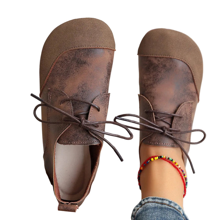 Schwarze Damen Komfort-Riemenschuhe für stilvollen Alltag; bequeme flache Alltagsschuhe mit unterstützendem Design.