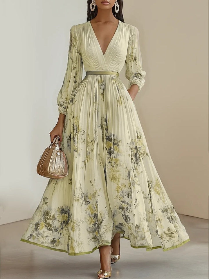 Langes, elegantes Damen Maxikleid. Romantisches Blumenmuster, V-Ausschnitt & Puffärmel. Perfekt für den Sommer.