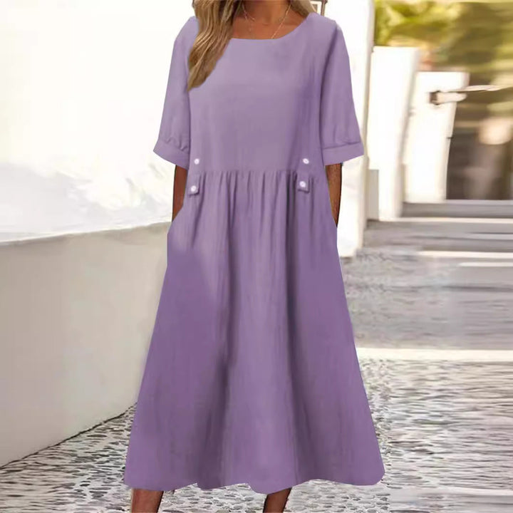 Modisches lockeres Midikleid für Damen, mit praktischen Taschen, ideal für Sommer und entspannten Urlaub.