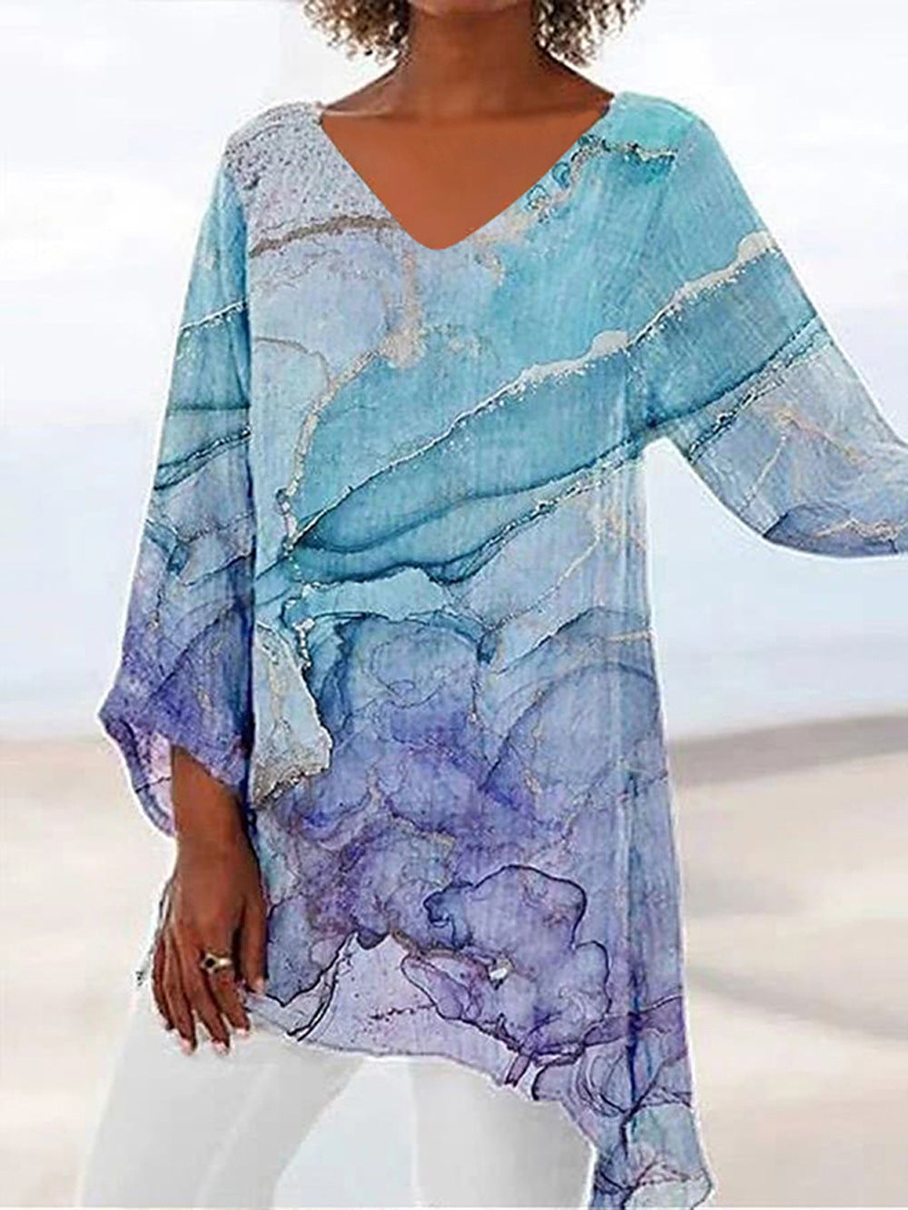 Komfortable Glitzer Tunika Bluse in Türkis für Damen. V-Ausschnitt, Dreiviertelarm. Elegant & Party geeignet.