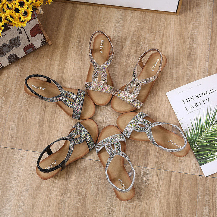 Schwarze Damen-Sandalen mit Keilabsatz und Strass, bequem und schick für jede Party.