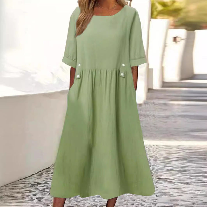 Luftiges Damen Midikleid mit praktischen Taschen, ideal als Sommer- oder Urlaubskleid, bequeme A-Linie, Kurzarm.