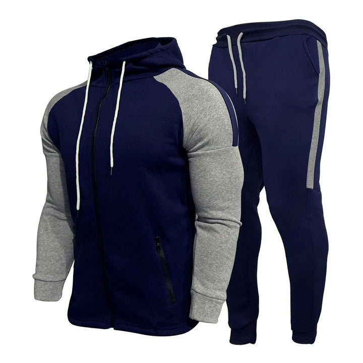 Moderner Herren Sportanzug für Training & Freizeit. Zweiteiler mit Jacke & Jogginghose bietet optimalen Tragekomfort.