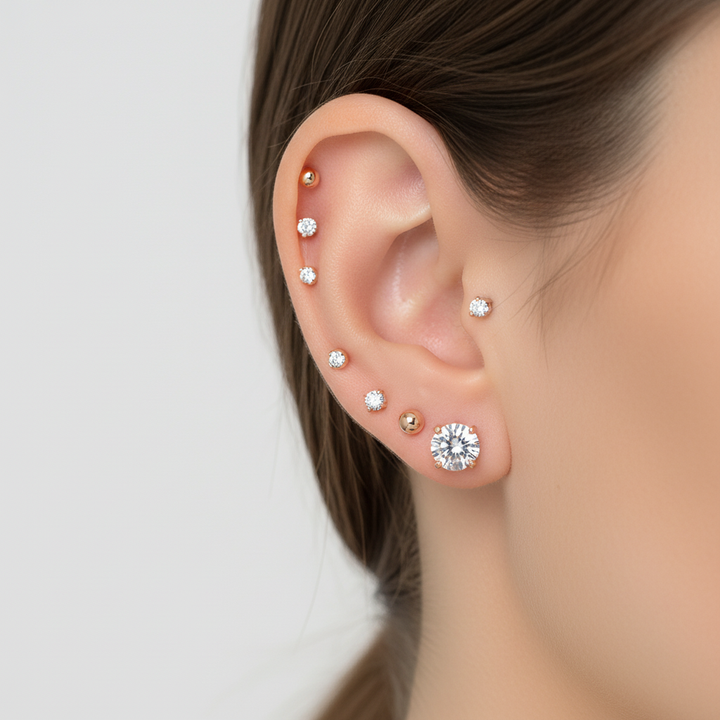 Zwei Damen Ohrstecker aus Titanstahl mit Zirkonia, als stilvolles Paar präsentiert, elegant & modern.