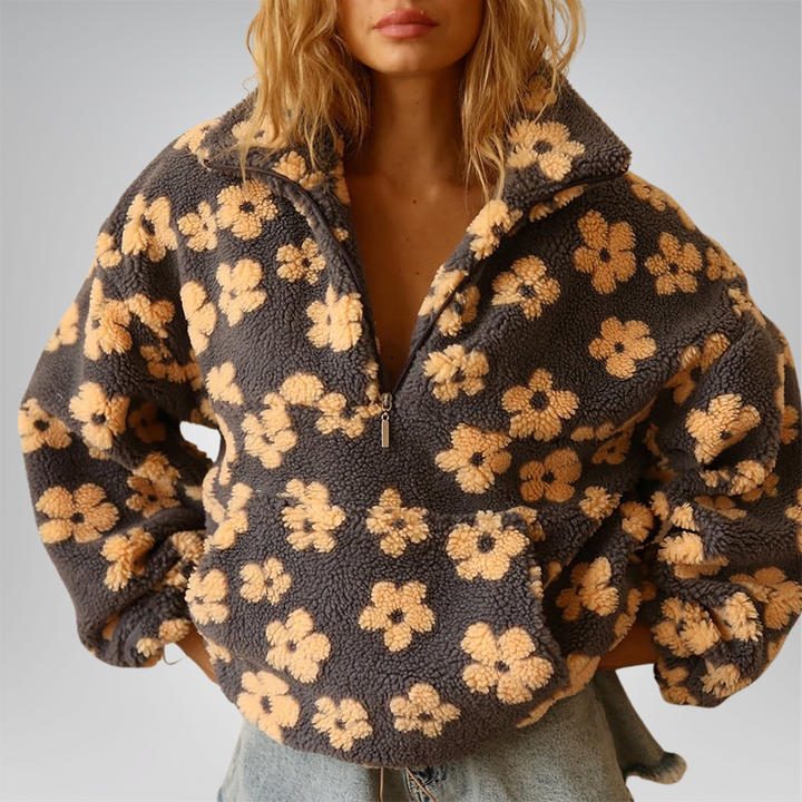 Gemütlicher Damen Langarm-Pullover mit floralem Design, perfekt für kalte Herbsttage.