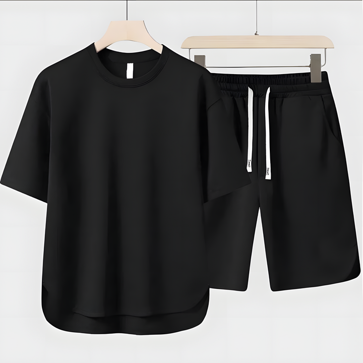 Schwarzes Herren Sommer-Set: Oversize T-Shirt und Shorts, atmungsaktiv & bequem. Ideal für Freizeit und warme Tage.